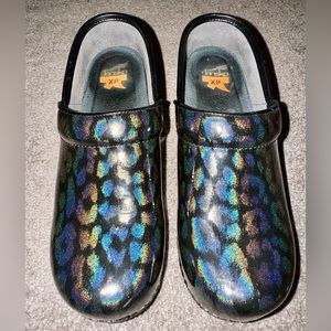 Like new Dansko iridescent cheetah print clogs